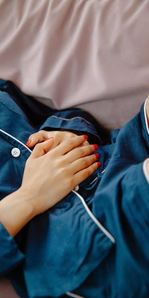 woman-lying-on-couch-3958565-min